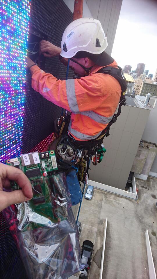 Media Screen Maintenance via Rope Access - Ropepro High Access Services